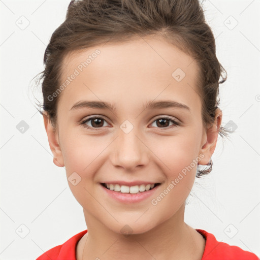 Joyful white child female with short  brown hair and brown eyes