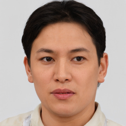 Neutral asian young-adult male with short  brown hair and brown eyes