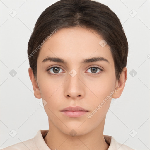 Neutral white young-adult female with short  brown hair and brown eyes