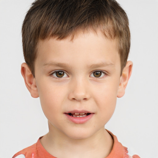 Joyful white child male with short  brown hair and brown eyes