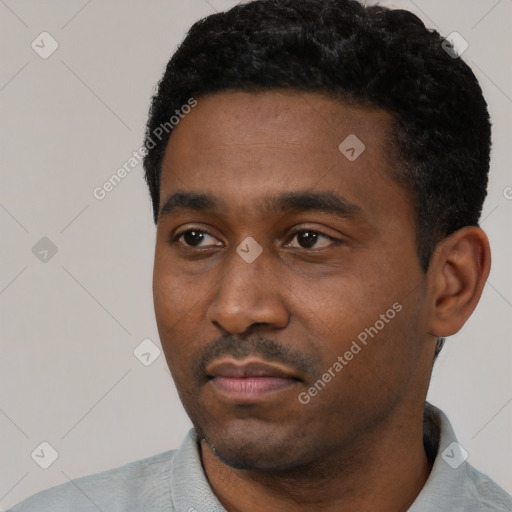 Neutral black young-adult male with short  black hair and brown eyes