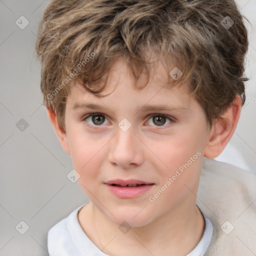 Joyful white child male with short  brown hair and brown eyes