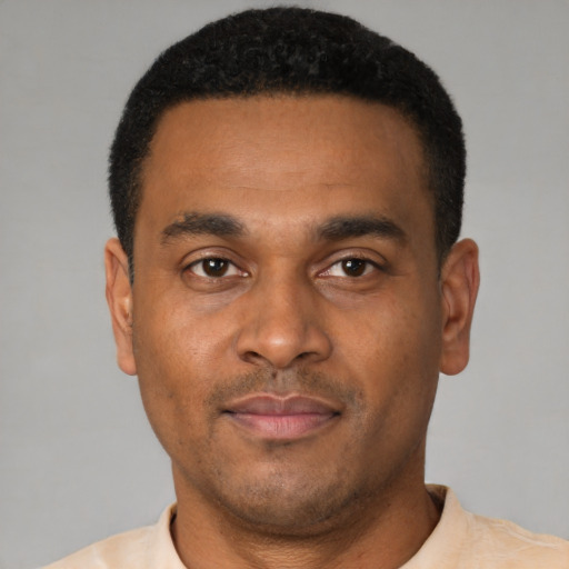 Neutral latino young-adult male with short  brown hair and brown eyes