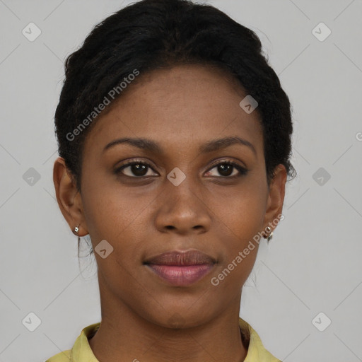 Joyful black young-adult female with short  brown hair and brown eyes