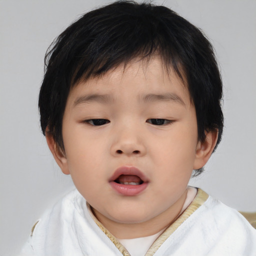 Neutral asian child female with short  brown hair and brown eyes