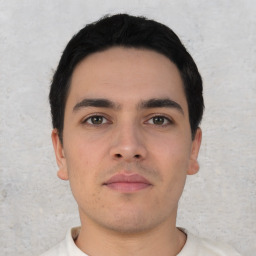 Neutral white young-adult male with short  black hair and brown eyes