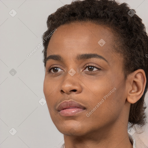 Neutral black young-adult female with short  brown hair and brown eyes