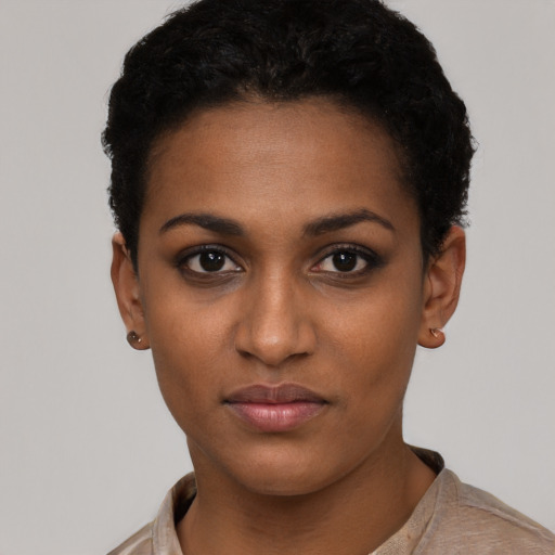 Neutral black young-adult female with short  black hair and brown eyes
