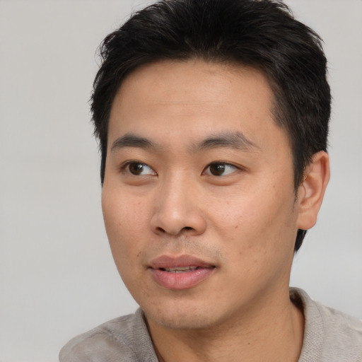 Neutral asian young-adult male with short  black hair and brown eyes