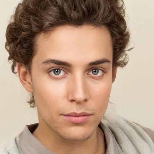 Neutral white young-adult male with short  brown hair and green eyes