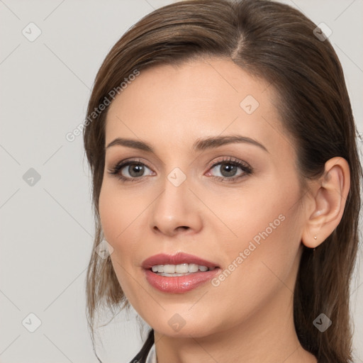 Joyful white young-adult female with medium  brown hair and brown eyes