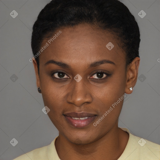 Joyful black young-adult female with short  brown hair and brown eyes