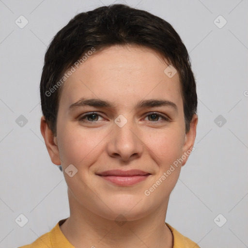 Joyful white young-adult female with short  brown hair and brown eyes