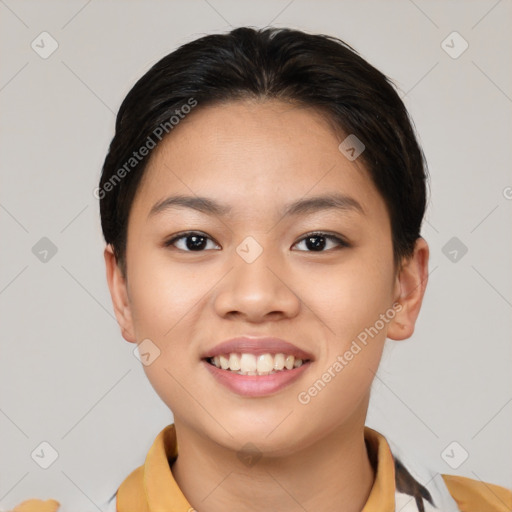 Joyful asian young-adult female with short  black hair and brown eyes