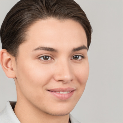 Joyful white young-adult female with short  brown hair and brown eyes