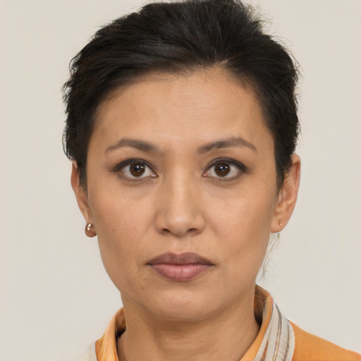 Neutral white young-adult female with short  brown hair and brown eyes