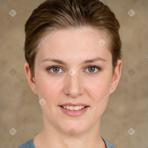 Joyful white young-adult female with short  brown hair and grey eyes