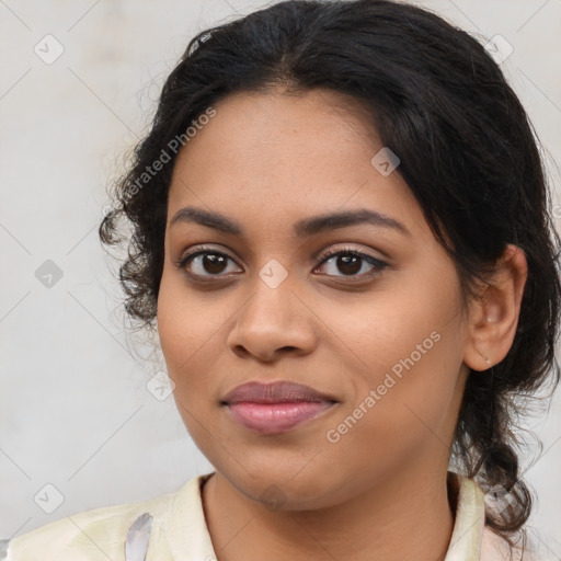 Joyful latino young-adult female with medium  brown hair and brown eyes