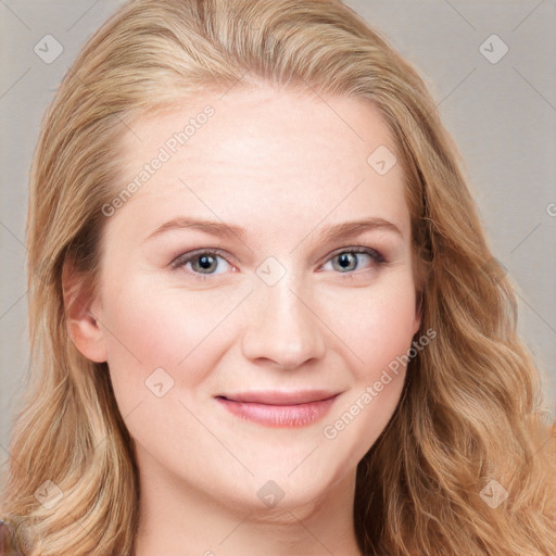 Joyful white young-adult female with long  brown hair and blue eyes