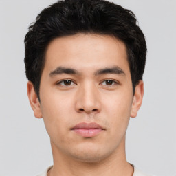 Neutral asian young-adult male with short  black hair and brown eyes