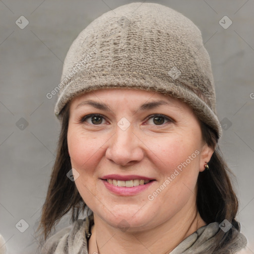 Joyful white adult female with medium  brown hair and grey eyes