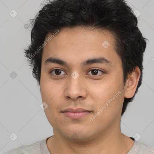 Neutral latino young-adult male with short  brown hair and brown eyes