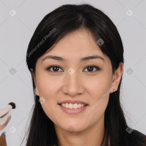 Joyful asian young-adult female with long  black hair and brown eyes