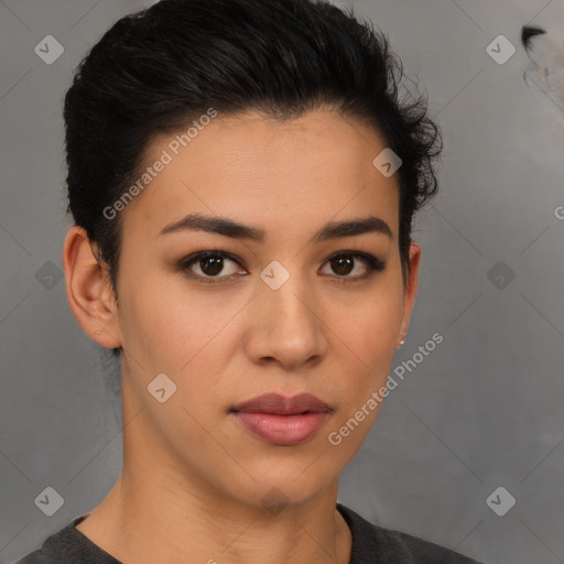 Joyful latino young-adult female with short  brown hair and brown eyes