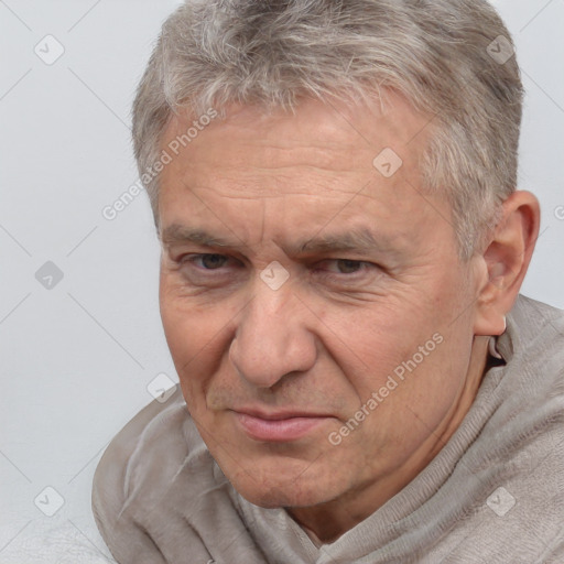 Neutral white middle-aged male with short  gray hair and brown eyes