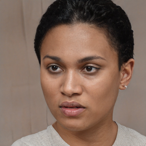 Neutral black young-adult female with short  black hair and brown eyes