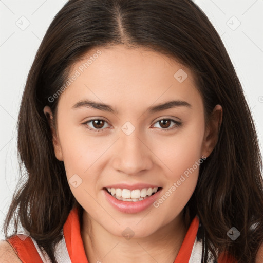 Joyful white young-adult female with long  brown hair and brown eyes