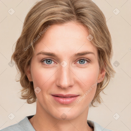 Joyful white young-adult female with medium  brown hair and blue eyes