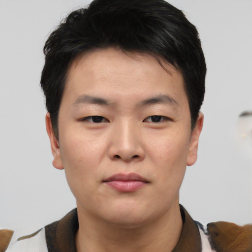 Neutral asian young-adult male with short  brown hair and brown eyes