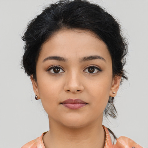 Neutral latino young-adult female with medium  brown hair and brown eyes