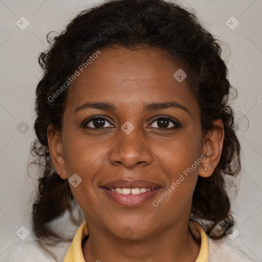 Joyful black young-adult female with medium  brown hair and brown eyes