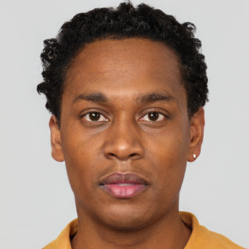 Neutral black young-adult male with short  brown hair and brown eyes