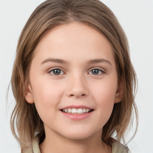 Joyful white child female with medium  brown hair and brown eyes