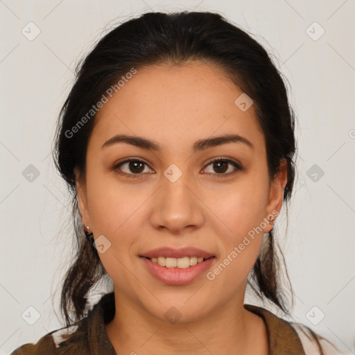 Joyful latino young-adult female with medium  brown hair and brown eyes