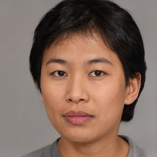 Neutral asian young-adult female with medium  black hair and brown eyes