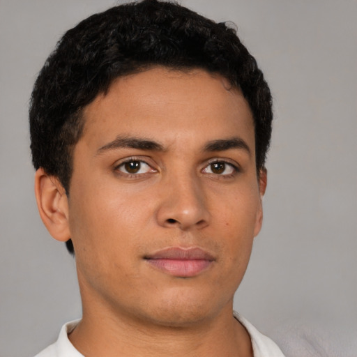 Neutral latino young-adult male with short  brown hair and brown eyes