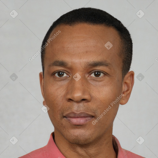 Neutral black adult male with short  black hair and brown eyes
