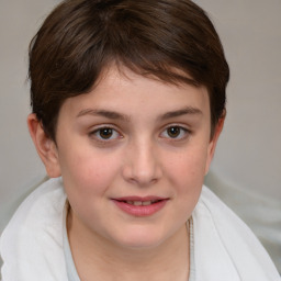 Joyful white child female with medium  brown hair and brown eyes