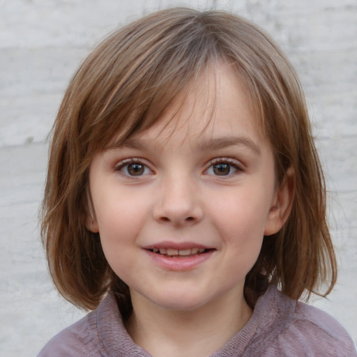 Joyful white child female with medium  brown hair and grey eyes