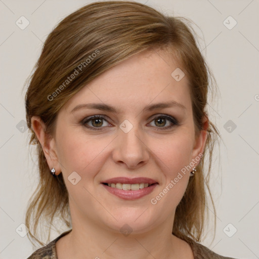 Joyful white young-adult female with medium  brown hair and grey eyes