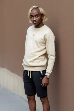 Sudanese adult male with  blonde hair