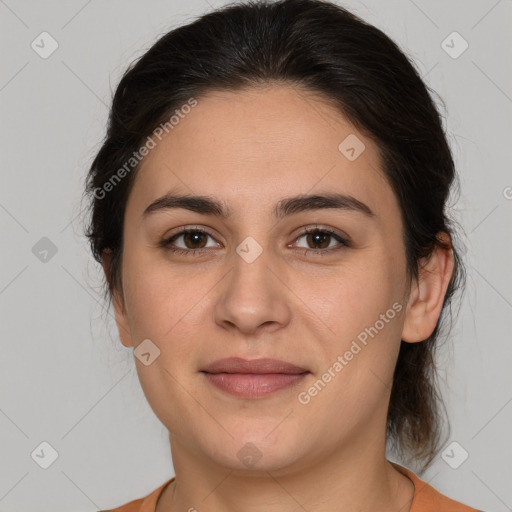 Joyful white young-adult female with medium  brown hair and brown eyes