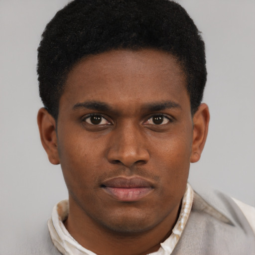 Neutral black young-adult male with short  brown hair and brown eyes