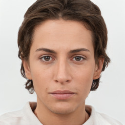 Neutral white young-adult female with short  brown hair and grey eyes