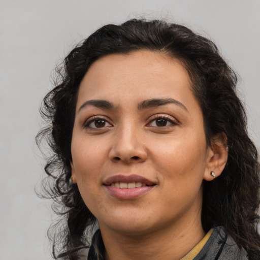 Joyful latino young-adult female with medium  black hair and brown eyes