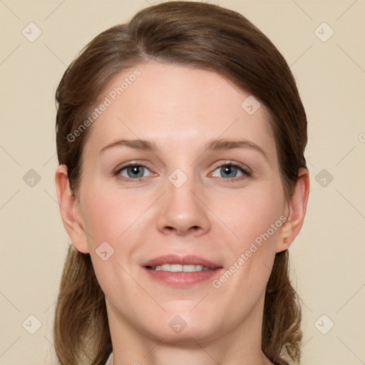 Joyful white young-adult female with long  brown hair and grey eyes